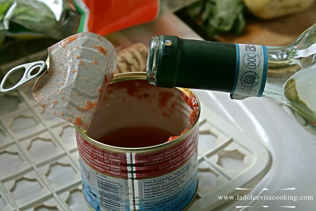 Rinse off the can with the white wine