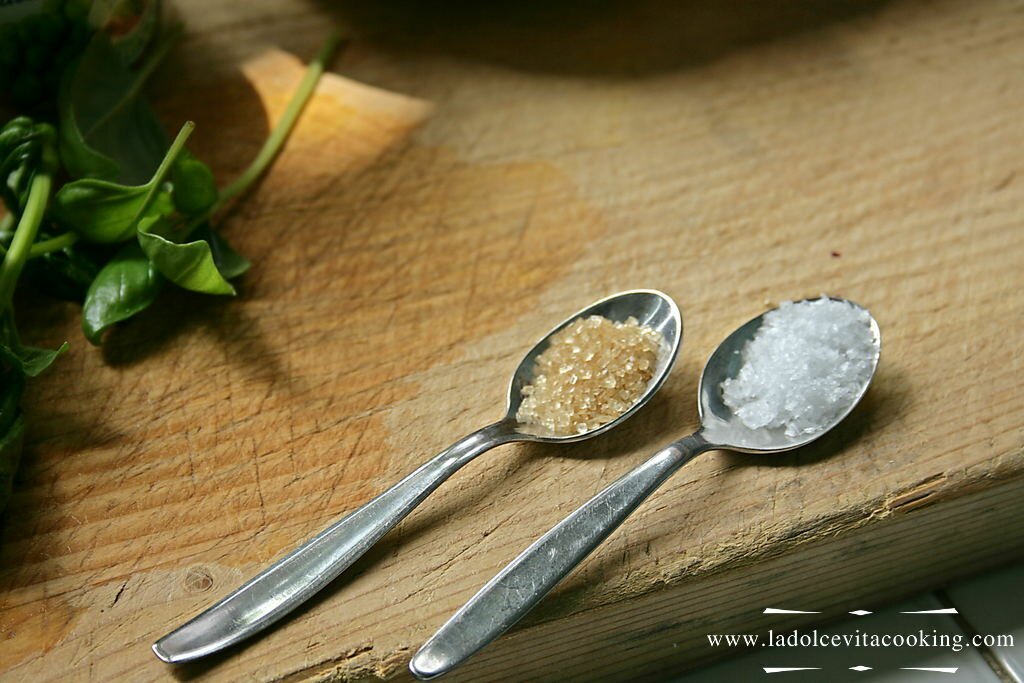 Spoons with salt and sugar